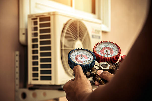 Professional Air Conditioning Service technician working in Whites Creek, TN